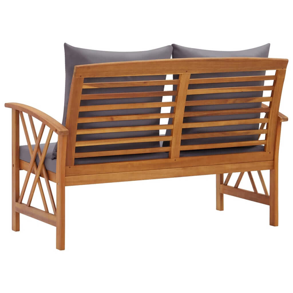 Garden bench with cushions made of solid acacia wood, showcasing a modern design for outdoor furniture and patio lounge.