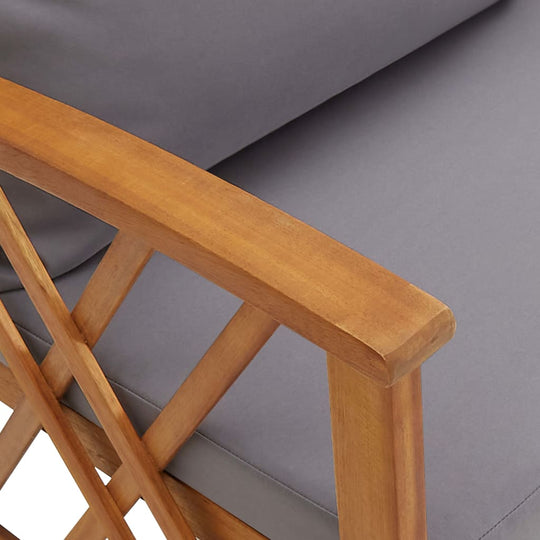 Close-up of solid acacia wood garden bench armrest with gray cushion, showcasing outdoor furniture design and durability.