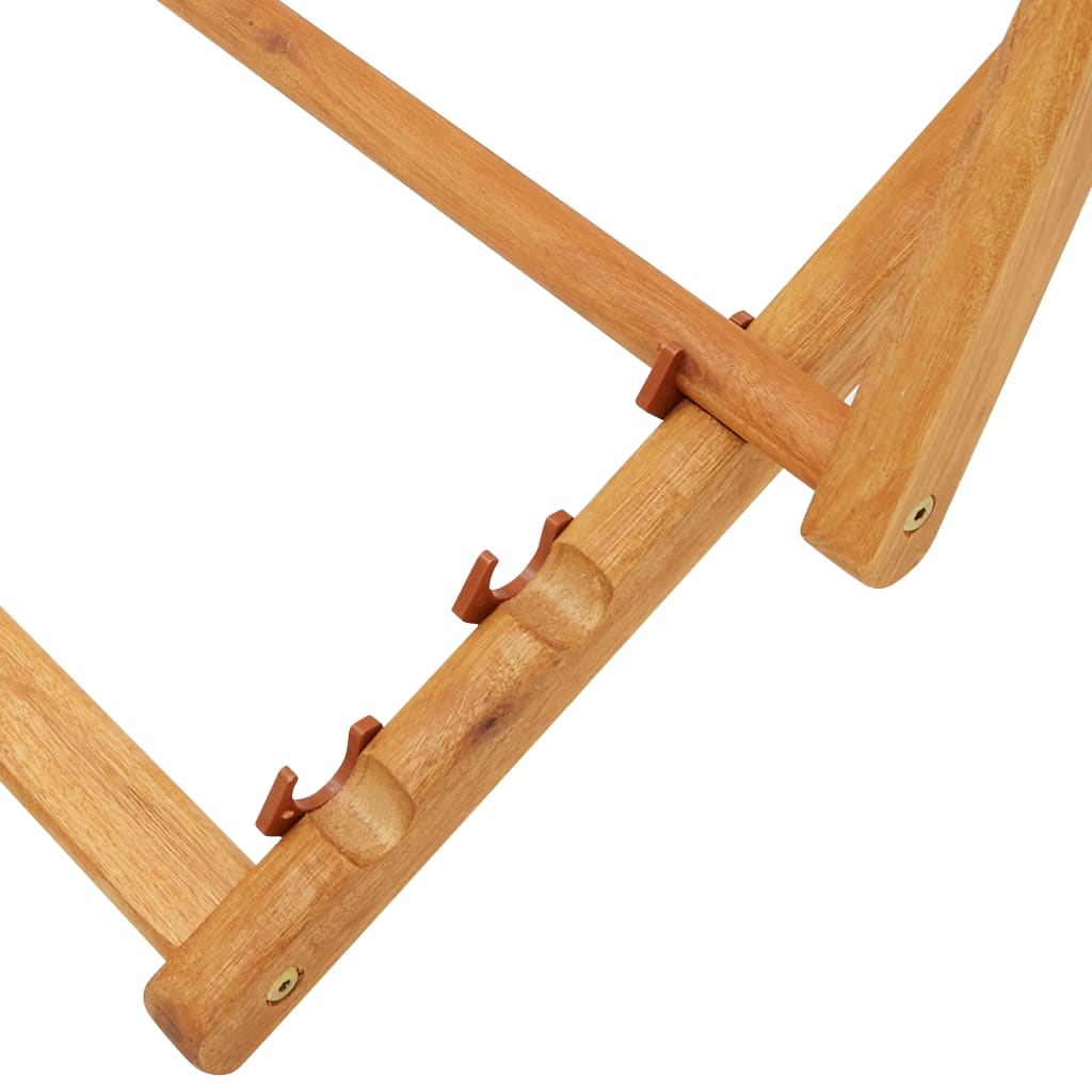 Close-up of the eucalyptus wood frame of a folding beach chair showcasing sturdy construction and adjustable recline settings.