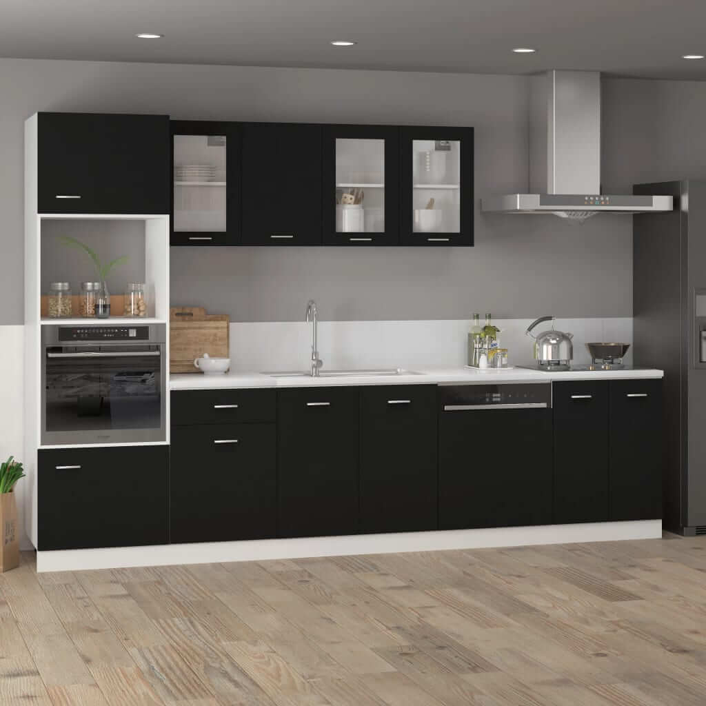 Modern black kitchen cabinetry design with sleek lines and ample storage, featuring upper and lower cabinets.