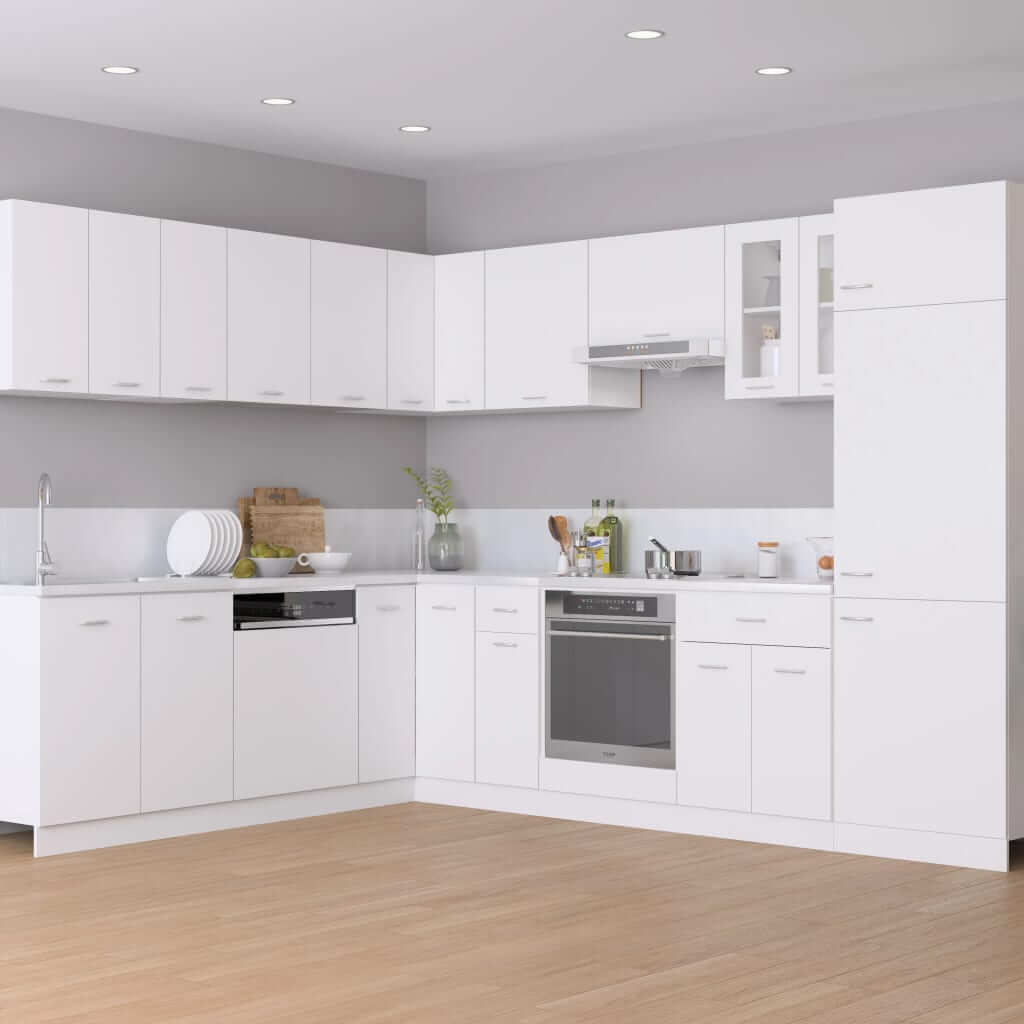 Modern white kitchen design featuring sleek cabinets and appliances for an organized space. Perfect for functional living!