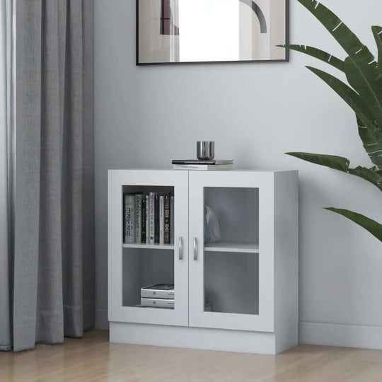 Vitrine cabinet in white engineered wood with two doors and spacious compartments for books and decor in a modern living space.