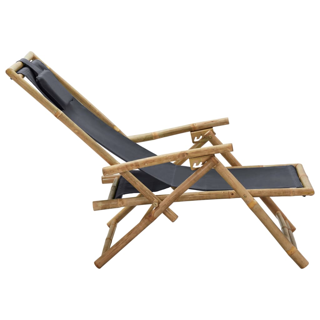 Dark grey bamboo folding relaxing lounge chair with adjustable backrest for outdoor comfort. Perfect for relaxation and easy cleaning.