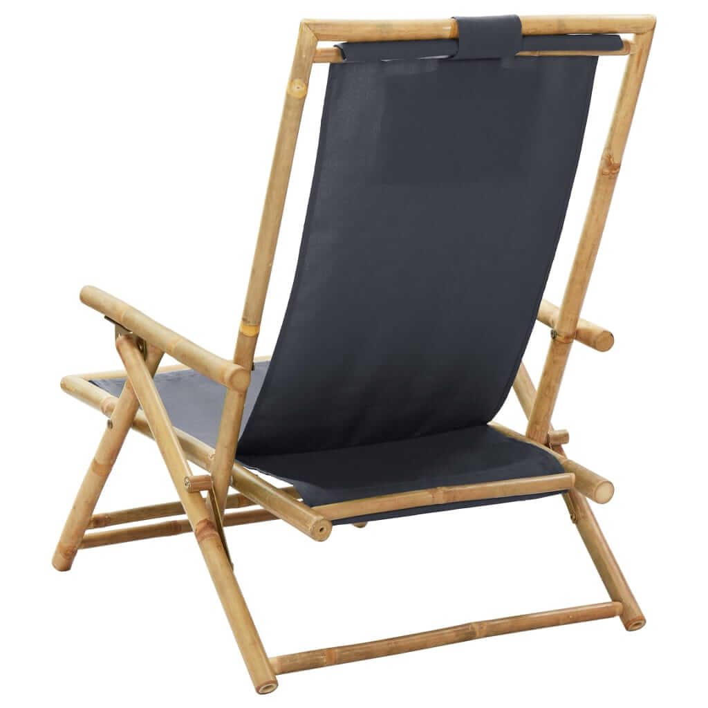 Dark grey bamboo folding relaxing chair with adjustable backrest and comfortable fabric seat, perfect for outdoor lounging.