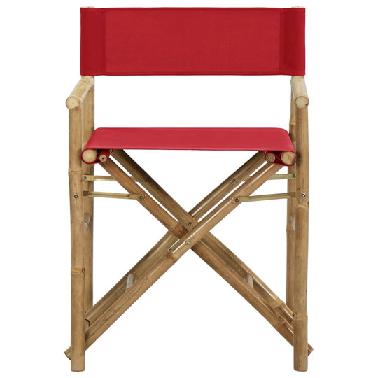 Folding director's chair in red fabric with bamboo frame, ideal for outdoor furniture and patio relaxation.