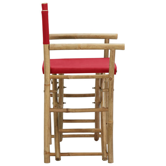 Folding director's chair in red fabric with bamboo frame, ideal for outdoor furniture and garden relaxation.