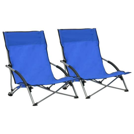 Two folding beach chairs in blue fabric, featuring a strong steel frame for outdoor relaxation and comfort.