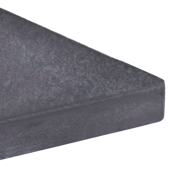 Close-up of a black granite square umbrella weight plate, showcasing its durable and elegant design for outdoor furniture stability.