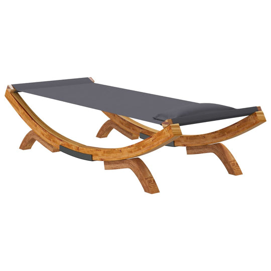 Outdoor lounge bed in solid bent wood with gray fabric, perfect for relaxing in the garden or patio.