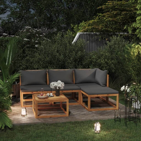 5 Piece Garden Lounge Set with grey cushions, solid acacia wood frame in a serene outdoor setting with greenery.