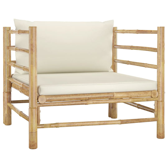 Garden sofa with cream white cushions made of bamboo, ideal for outdoor lounging and patio decor.