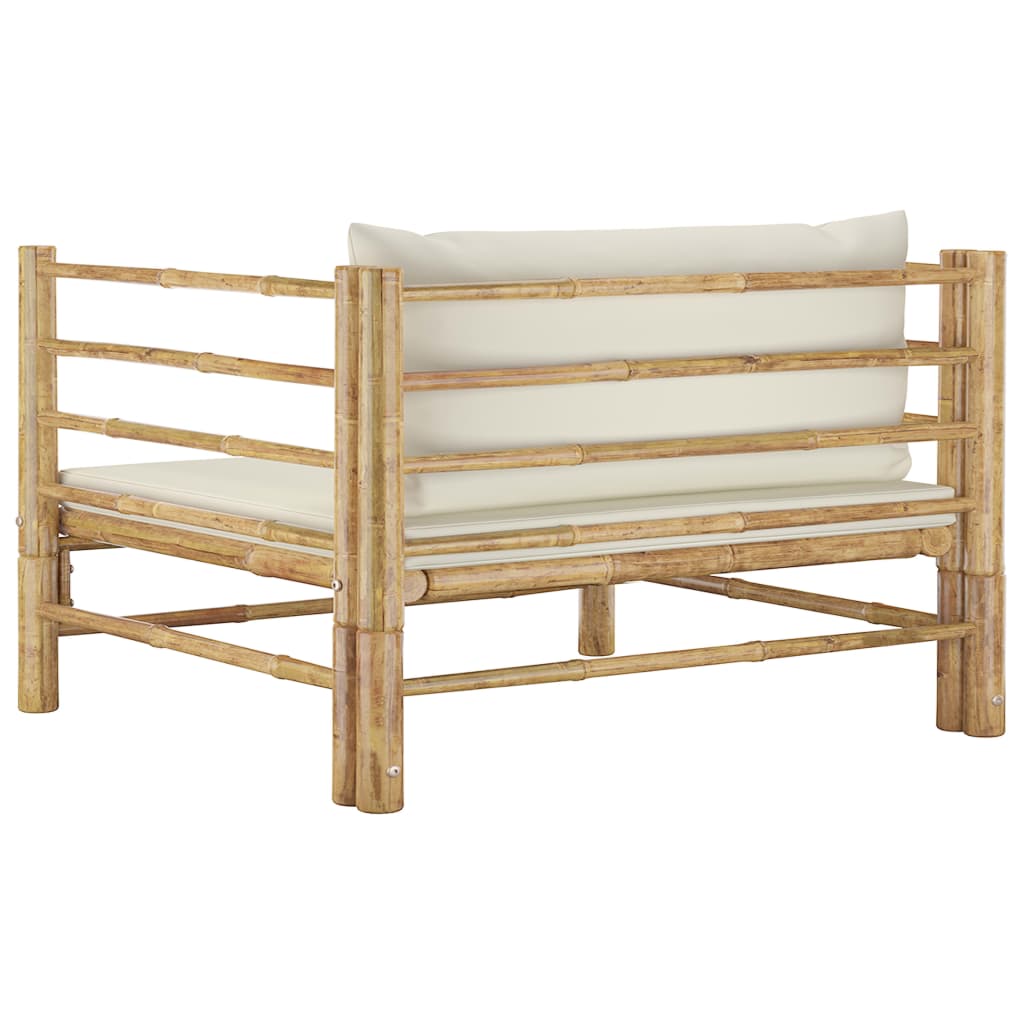 Bamboo garden sofa with cream white cushions, perfect for outdoor lounge and patio furniture.