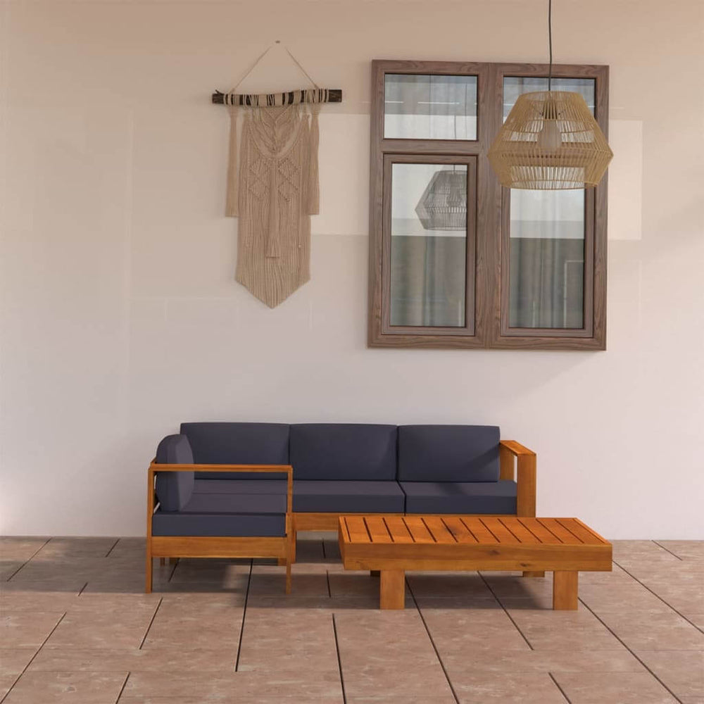 Acacia wood garden lounge set with dark cushions for outdoor patio or balcony relaxation.