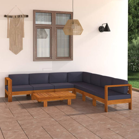 8 Piece outdoor lounge set with dark grey cushions and acacia wood, perfect for patios and gardens. Stylish and durable مفروشات أثاث.