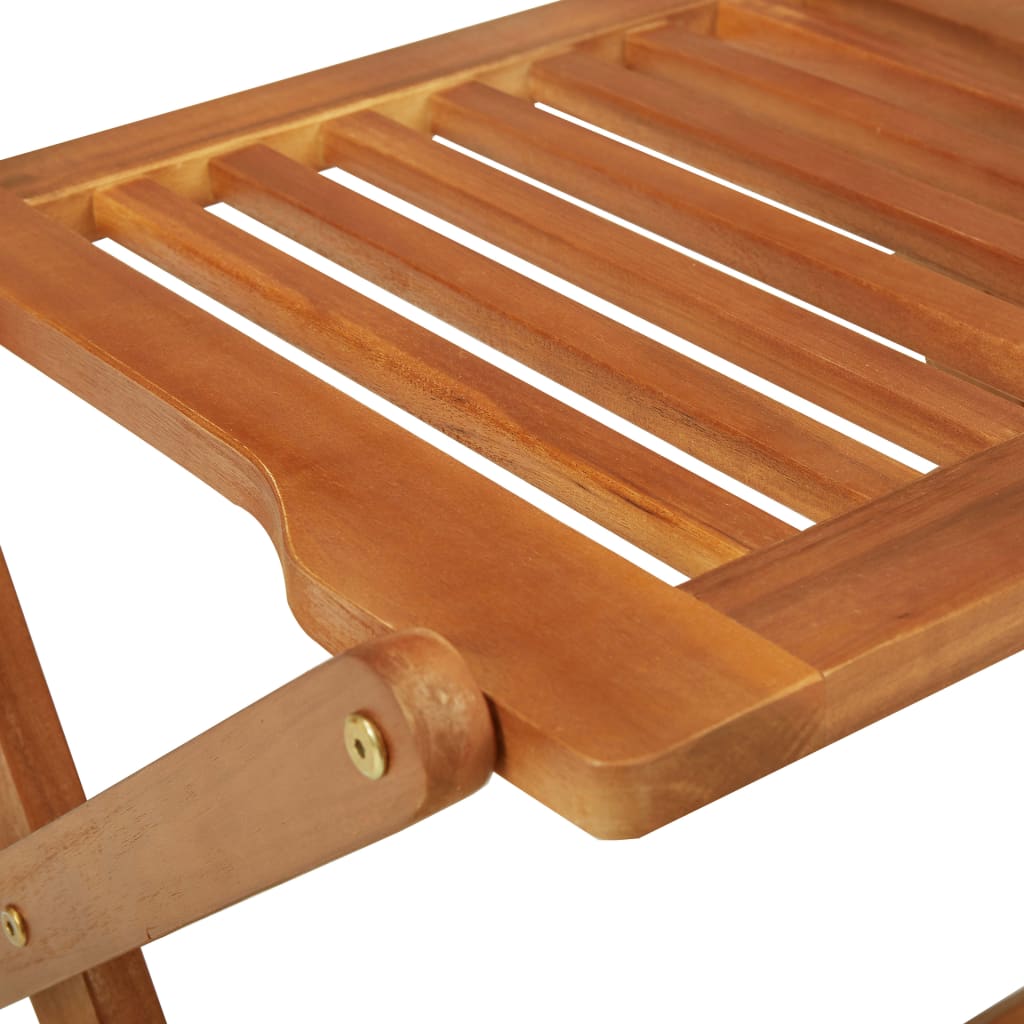 Close-up of solid acacia wood folding garden dining table showcasing slatted design and sturdy construction.