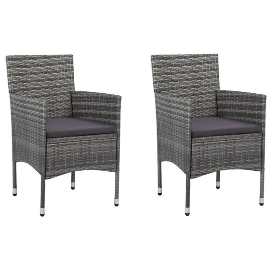 Set of two grey poly rattan garden chairs with cushions, perfect for outdoor dining and gatherings.