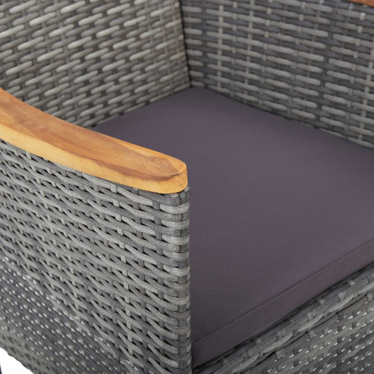 5 Piece Garden Dining Set  Poly Rattan and Acacia Wood close-up of armchair with gray woven rattan and comfort cushion.
