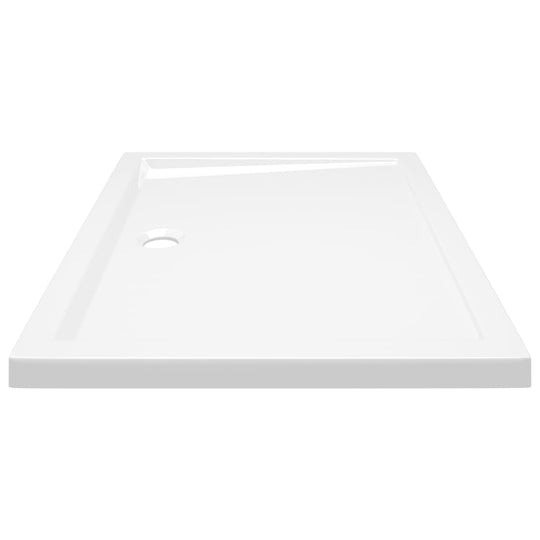 Rectangular ABS shower base tray 70x90 cm with a high gloss finish and drain hole, ideal for modern bathrooms and easy entry.