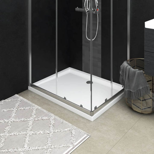 Rectangular ABS shower base tray, 70x90 cm, modern bathroom design with polished finish and low threshold for easy access.