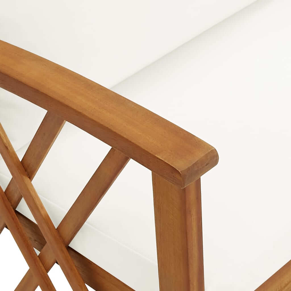 Close-up of solid acacia wood armrest with white cushion from a stylish outdoor lounge set.