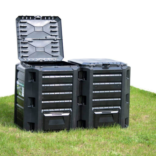 Black 1200L garden composter bin with lids open, designed for efficient organic waste decomposition in outdoor spaces.