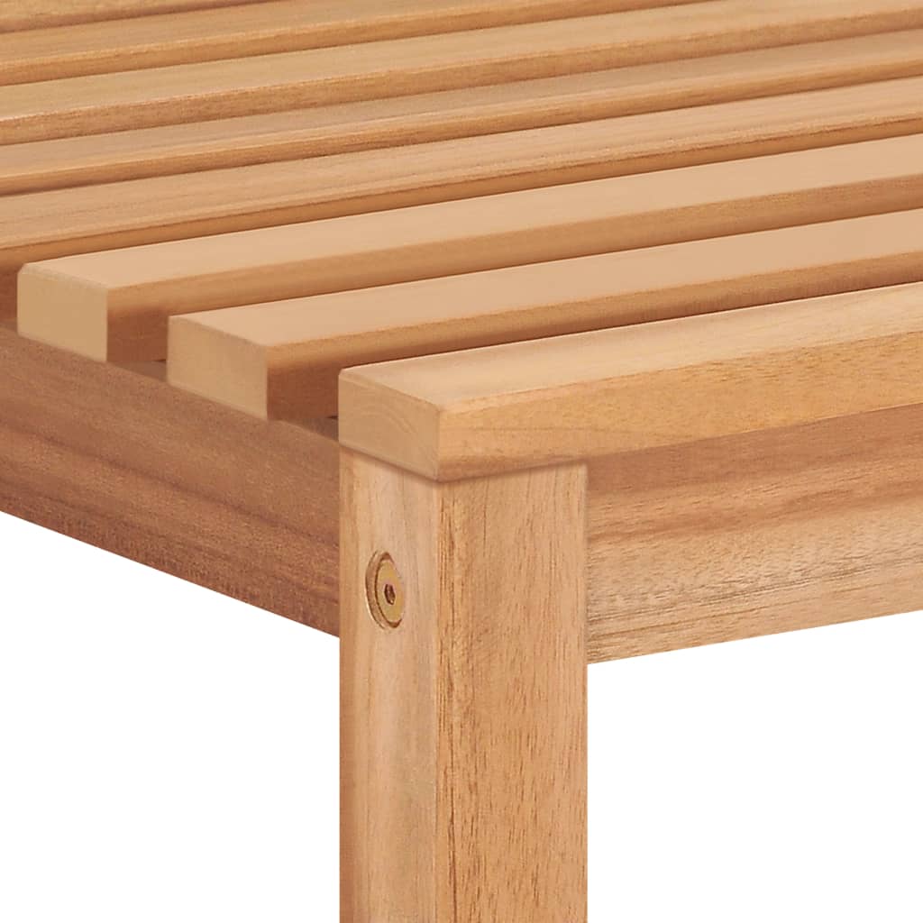 Close-up of solid teak wood slats in garden furniture, showcasing durability and smooth finish for outdoor relaxation.