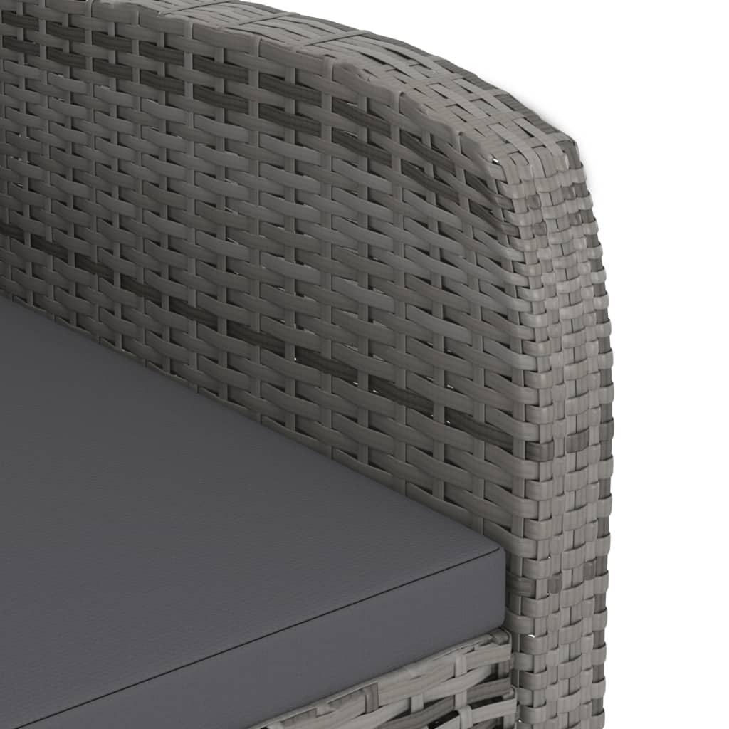 Close-up of grey PE rattan weave on outdoor dining set with cushioned tabletop, showcasing durability and contemporary design.