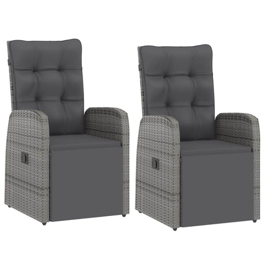 Set of two grey poly rattan outdoor chairs with cushions, featuring high backs and armrests, ideal for garden use.