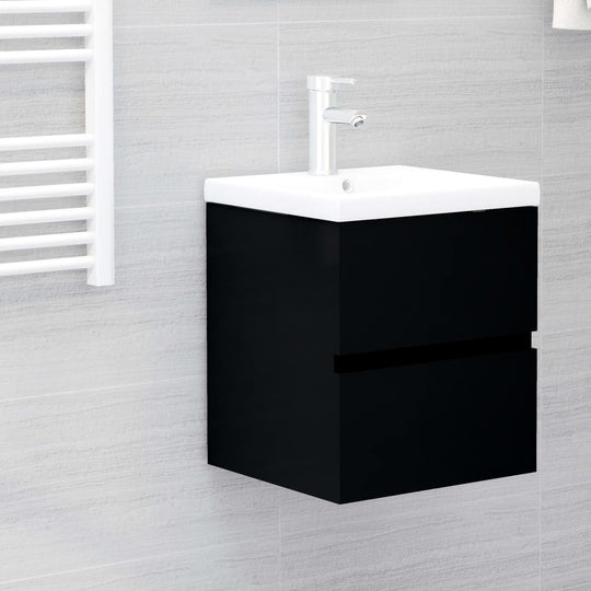 Black sink cabinet with sleek design and integrated sink, perfect for modern bathroom storage solutions.