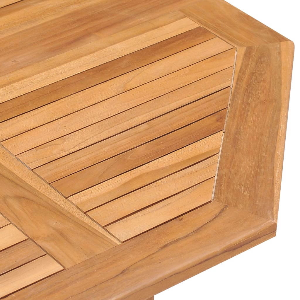 Close-up of polished teak wood surface on folding outdoor dining table, showcasing durability and elegance for garden furniture.