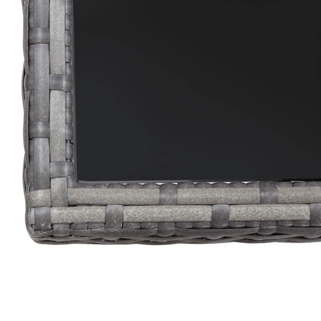 Close-up of the glass tabletop edge of the 3 Piece Garden Dining Set Poly Rattan, showcasing the woven rattan border.