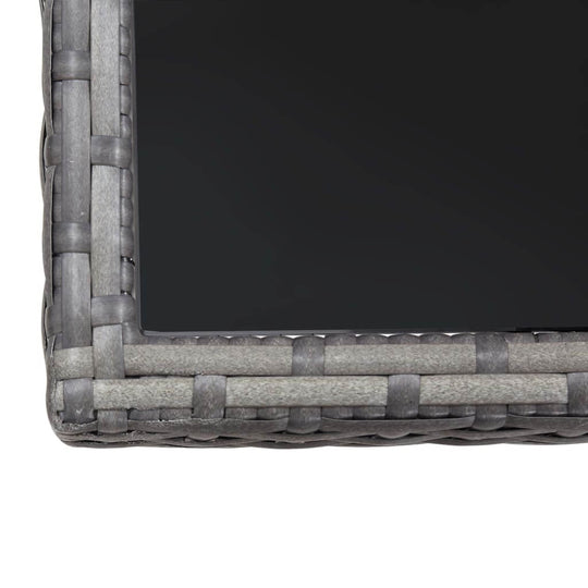 Close-up of the glass tabletop edge of the 3 Piece Garden Dining Set Poly Rattan, showcasing the woven rattan border.