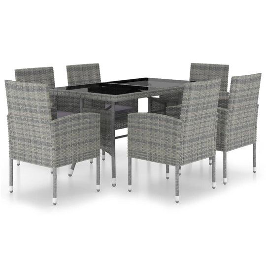 7 Piece Garden Dining Set Poly Rattan Anthracite & featuring a stylish table and six chairs with glass top.