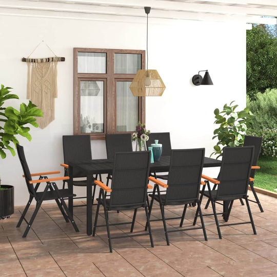 Outdoor garden dining set with black chairs and brown armrests, perfect for patio or terrace furniture.