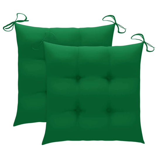 Two green outdoor cushions with ties for secure attachment, perfect for enhancing garden chairs and outdoor furniture comfort.