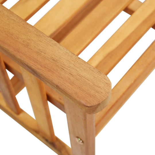 Close-up of solid acacia wood chair armrest showcasing natural grain and sturdy construction for outdoor furniture.