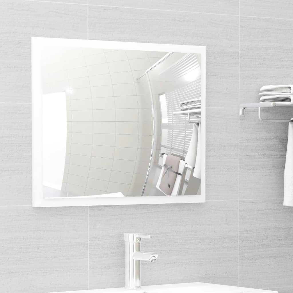 Stylish square bathroom mirror reflecting a modern, tidy space with sleek lines and engineered wood accents.