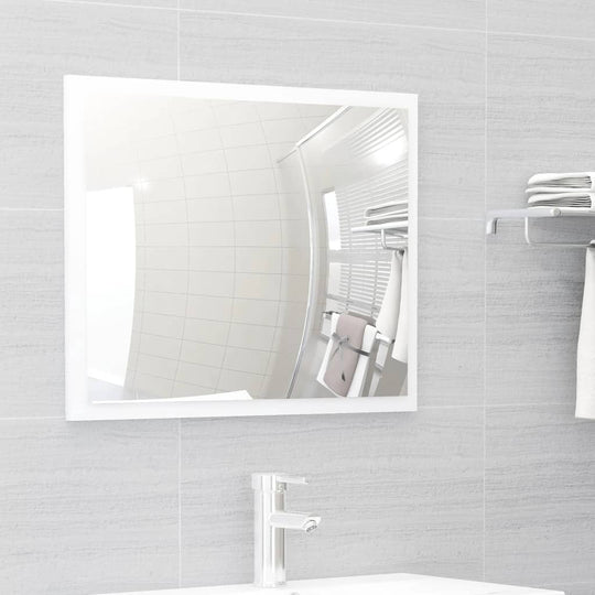 Stylish square bathroom mirror reflecting a modern, tidy space with sleek lines and engineered wood accents.