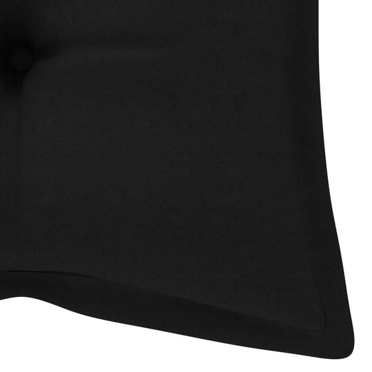 Close-up of a black cushion designed for outdoor garden furniture, showcasing its smooth fabric and shape.