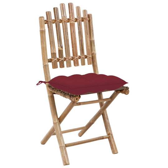 Folding bamboo garden chair with cushion, perfect for outdoor dining and easy storage, durable furniture.