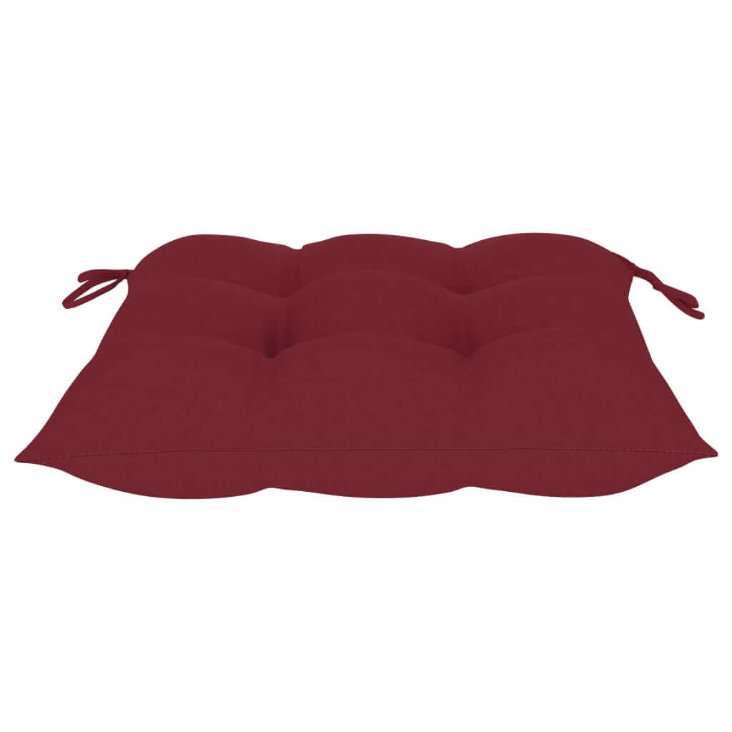 Red cushioned seat pad with ties, perfect for outdoor furniture and adding comfort to garden chairs.