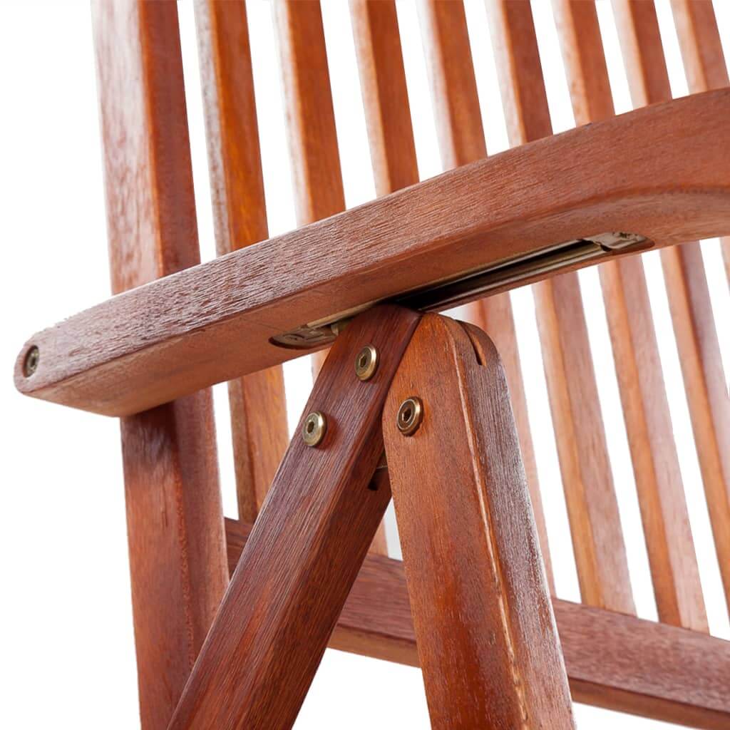 Detailed view of a folding garden chair's wooden frame, showcasing its solid acacia construction and sturdy hinge mechanism.