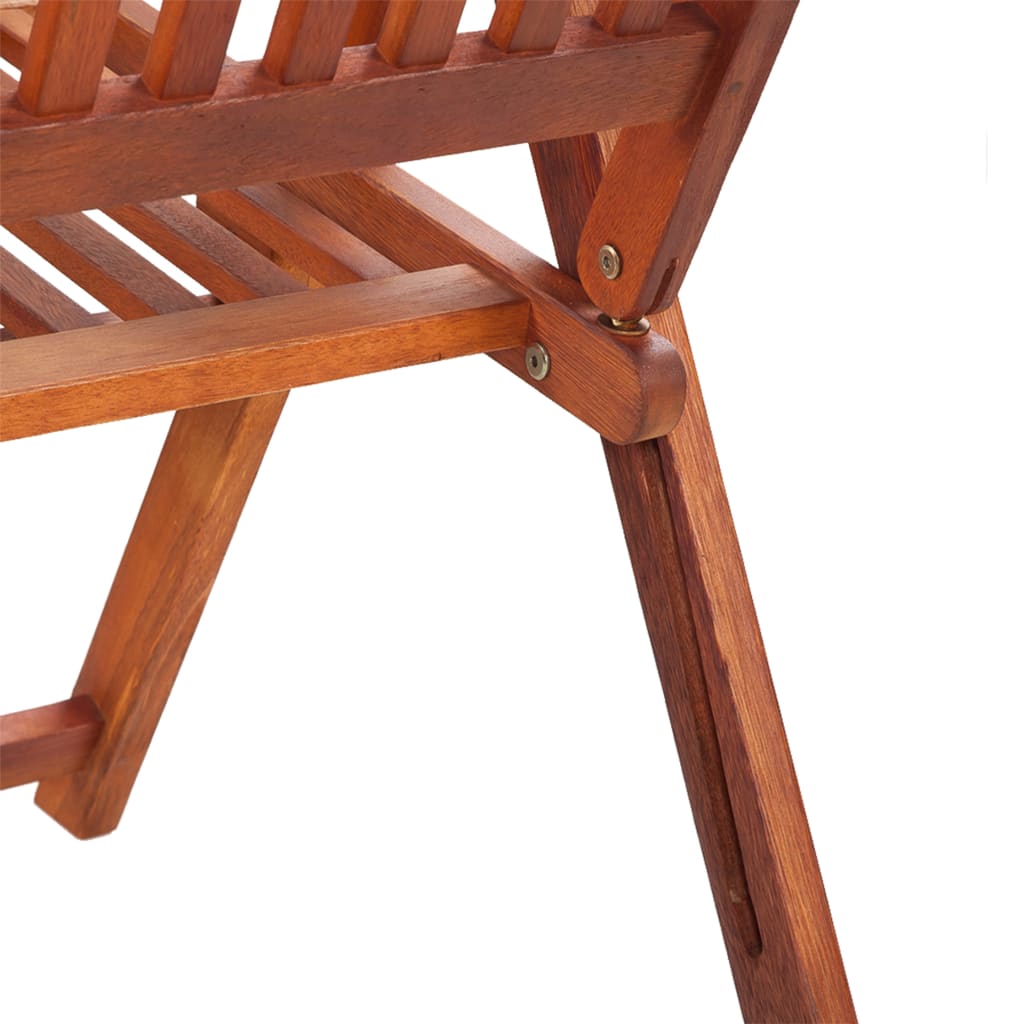 Close-up of folding garden chair's acacia wood frame and hinge, showcasing durability and vintage style in outdoor furniture.