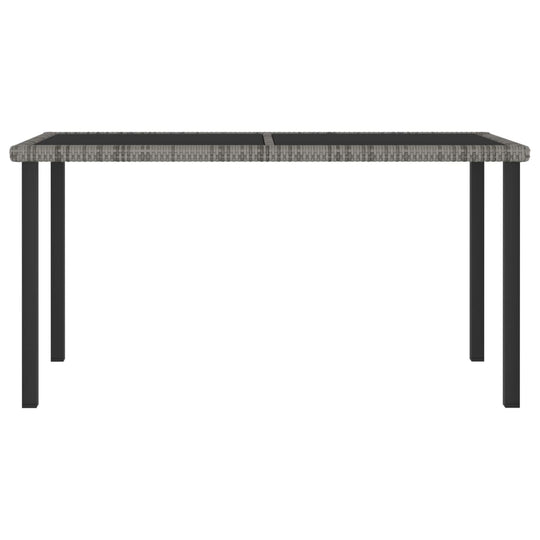 Modern outdoor furniture table with a poly rattan top and sturdy black steel legs, perfect for garden or patio dining.