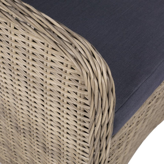 Close-up of a weather-resistant PE rattan chair with thick padding, part of a 5 Piece Garden Dining Set.