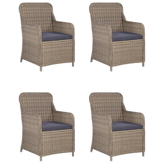 Set of four outdoor dining chairs made of weather-resistant PE rattan with blue cushions for added comfort.