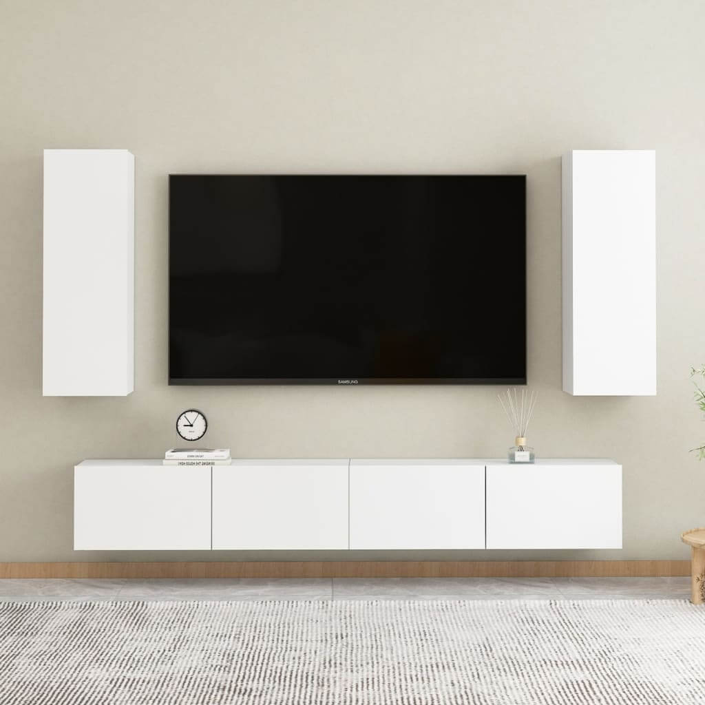 Modern white TV cabinets with wall-mounted design, stylishly displaying a flat-screen TV in a contemporary living room setting.