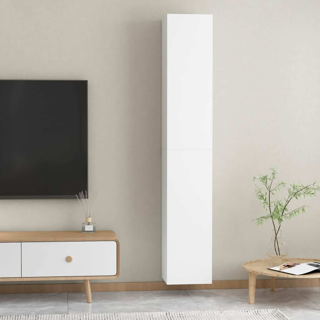 Modern white wall-mounted TV cabinet set against a minimalist living room backdrop. Stylish and practical furniture for storage.