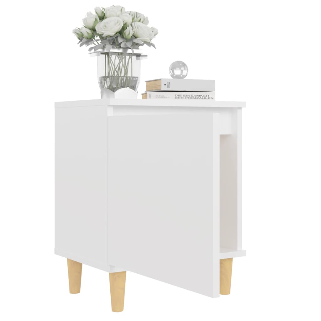 Bed cabinet with solid wood legs in white, showcasing Scandinavian design, perfect for organizing essentials.