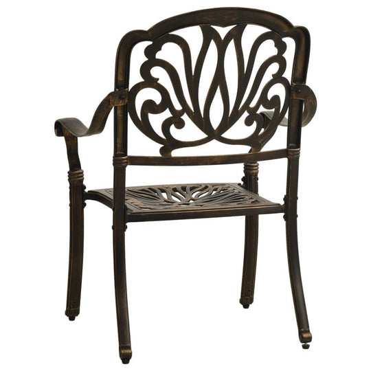 Elegant bronze cast aluminum chair with decorative patterns, ideal for outdoor bistro dining and comfortable seating.